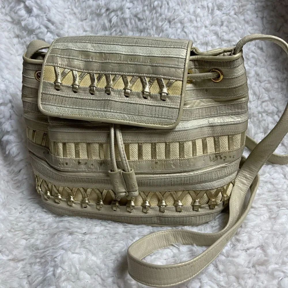 Sharif leather gold snake skin print metallic gold & beige drawstring bucket bag